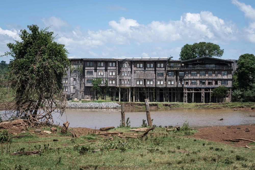 Wooden debris show remainings of the original location of the former tree house where Britain's Queen Elizabeth II of England stayed the night her father, the King, died and became Queen in 1952 at Treetops Lodge in Aberdare Narional Park in Nyeri, Kenya, on April 10, 2021. Photo by Yasuyoshi CHIBA / AFP