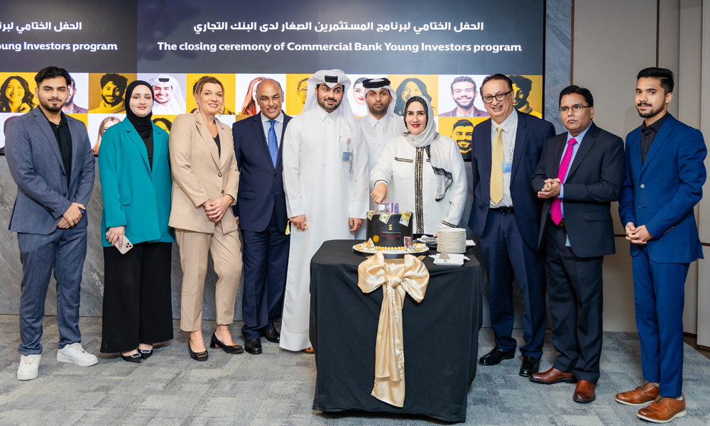 Officials pose for a photo during 'Young Investors Summer Intership Program.'