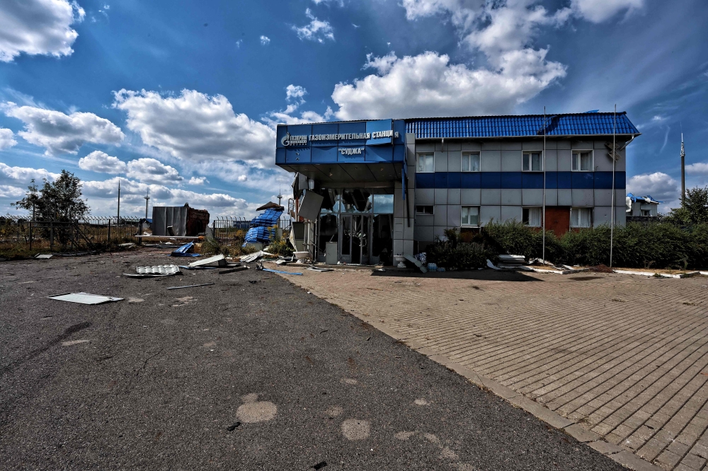 This photograph taken on August 16, 2024, during a media tour organised by Ukraine, shows a damaged gas measuring station 