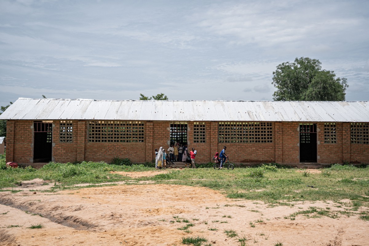 Children play outside of a classroom at the a school in Birao on August 12, 2024. Photo by Amaury Falt-Brown / AFP. 