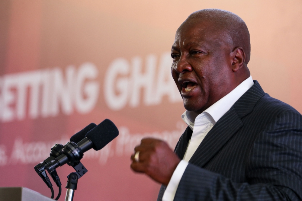 Former Ghana president and presidential candidate for the National Democratic Congress (NDC) John Dramani Mahama gestures while addressing delegates during the prty's manifesto's launch ahead of the 2024 Presidential Elections in Winneba, Ghana, on August 24, 2024. (Photo by Nipah Dennis / AFP)
