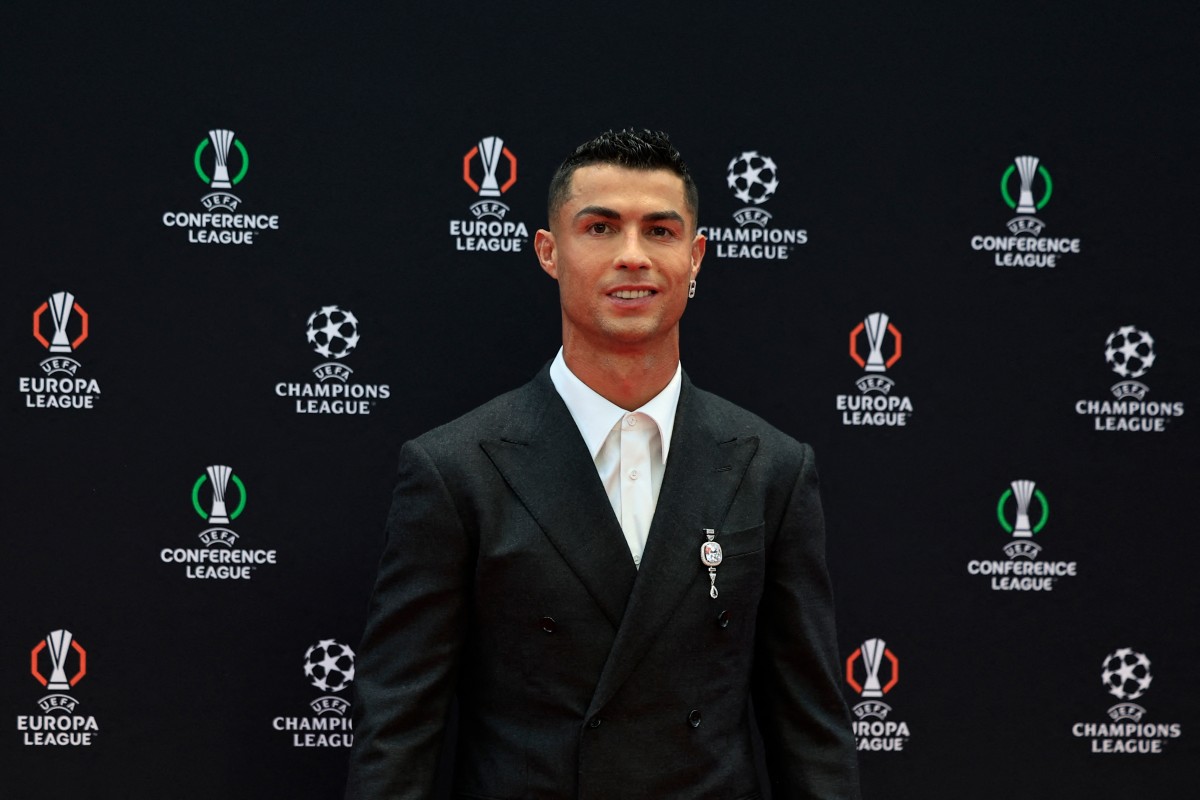 Al-Nassr's Portuguese forward Cristiano Ronaldo poses prior to the draw for the group stage of the 2024-2025 UEFA Champions League football tournament, at the Grimaldi Forum in Monaco on August 29, 2024. Photo by Valery HACHE / AFP.
