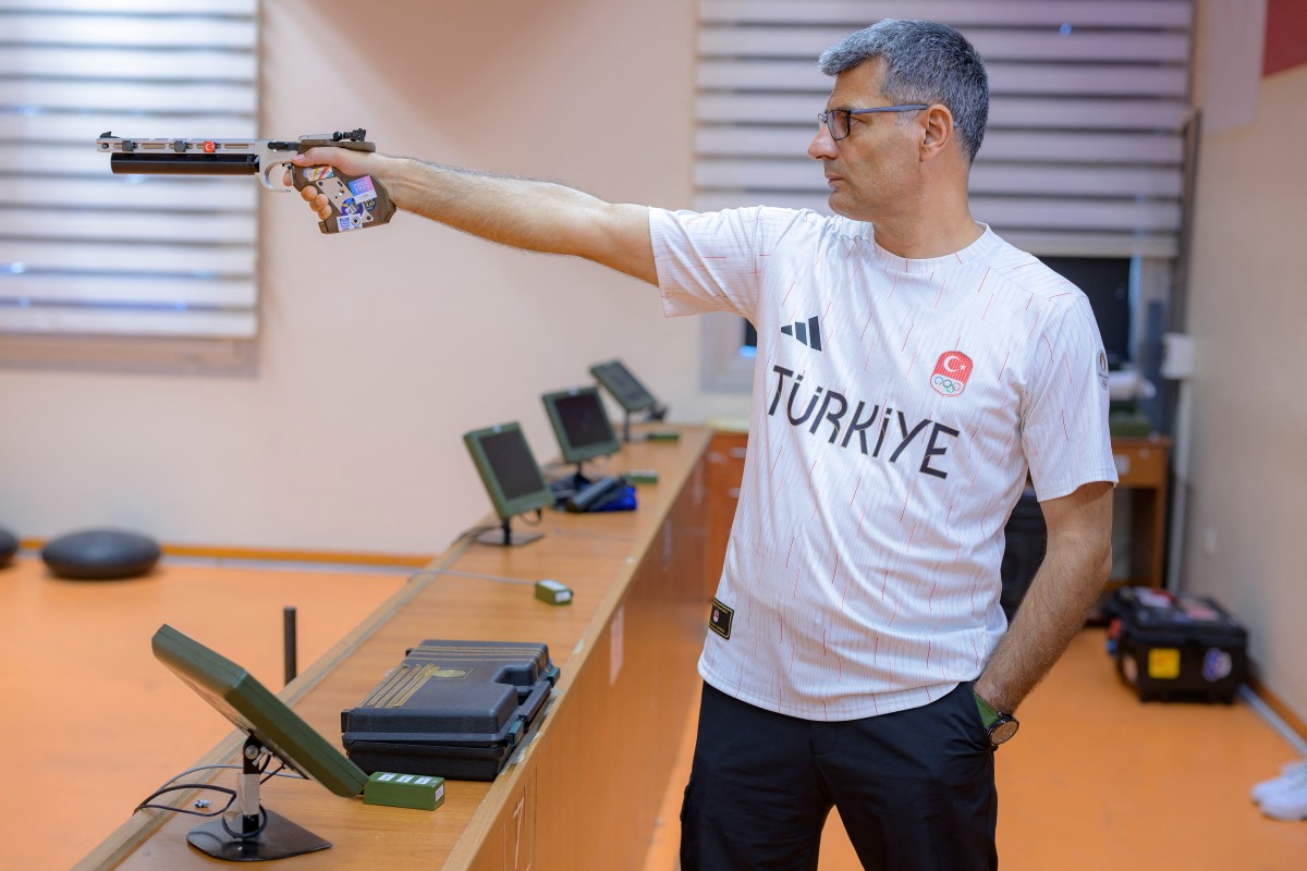 (FILES) Silver medalist at the Paris 2024 Olympic Games, Turkish shooter Yusuf Dikec poses for a photograph in Ankara on August 9, 2024. (Photo by Yasin AKGUL / AFP)
