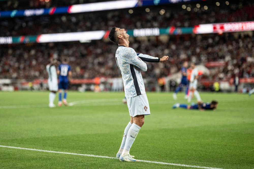 Portugal's forward #07 Cristiano Ronaldo reacts during the UEFA Nations League group A football match between Portugal and Croatia at the Luz stadium in Lisbon on September 5, 2024. (Photo by Patricia De Melo Moreira / AFP)