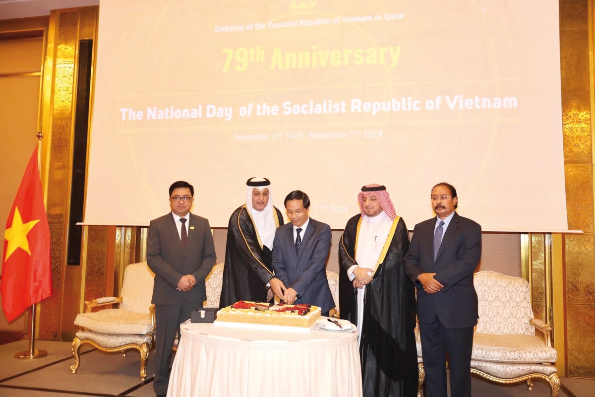 Minister of Communications and Information Technology H E Mohammed bin Ali Al Mannai (second left), Director of Department of Protocol at the Ministry of Foreign Affairs H E Ambassador Ibrahim Fakhroo (second right) and Ambassador of Vietnam to Qatar H E Nguyen Huy Hiep (centre) and other officials during the ceremony in Doha, yesterday.