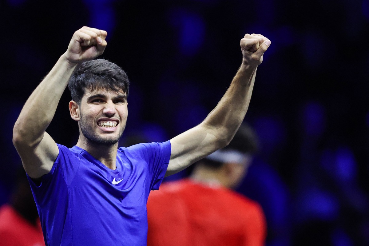 pain's Carlos Alcaraz of Team Europe celebrates winning against USA's Ben Shelton of Team World during their 2024 Laver Cup men's singles tennis match in Berlin, Germany on September 21, 2024. Alcaraz won the match 6-4, 6-4. (Photo by Ronny HARTMANN / AFP)