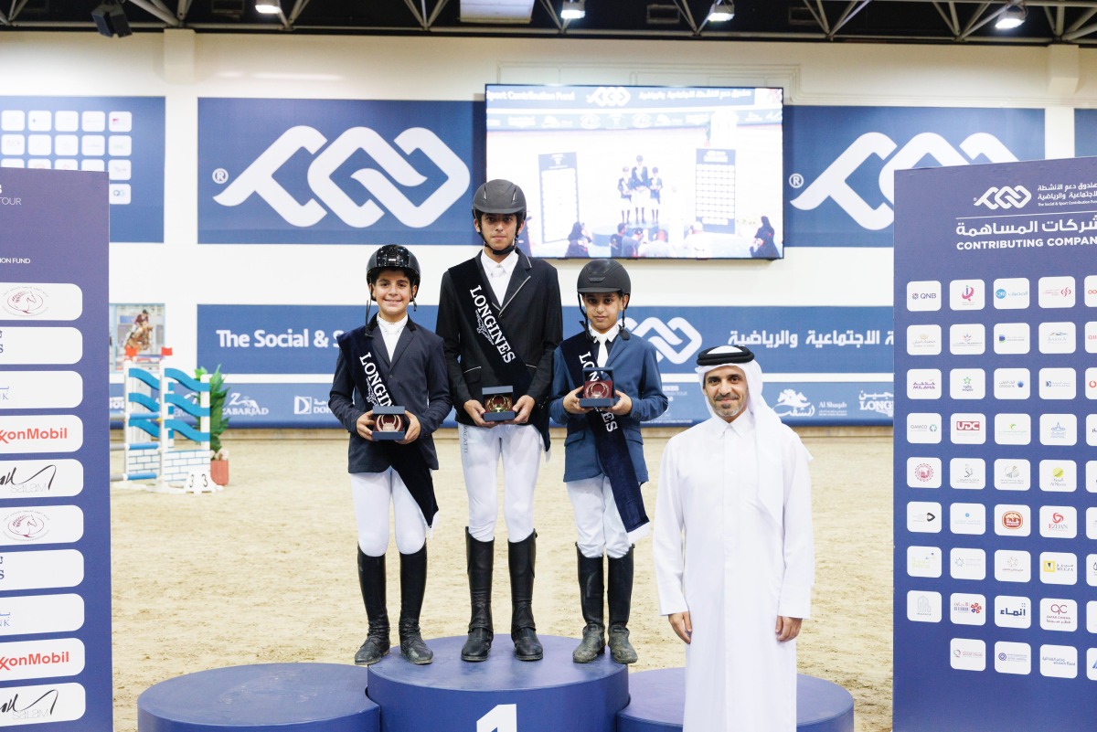Qatar Equestrian Federation (QEF) President Badr Al Darwish poses for a photo with the podium winners in the Future Riders 80cm class, Abdulla Khalifa Al Suwaidi (second left), Ahmed Mahmoud Alarrouqi (left), and Mohammed Salem Al Naemi (third left). 