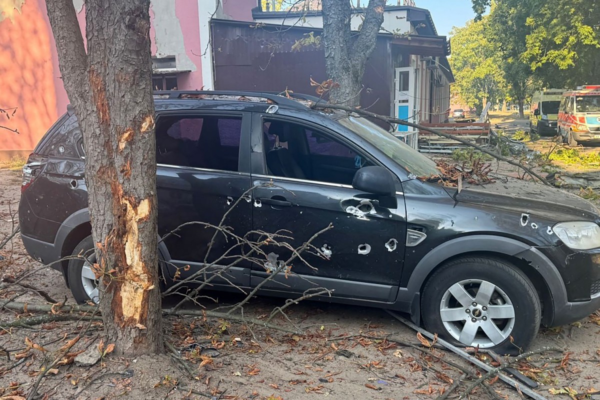 This handout photograph taken and released by the National Police of Ukraine on September 28, 2024, shows a damaged car in the courtyard of a hospital following a drone attack in Sumy. (Photo by Handout / National Police of Ukraine / AFP)
