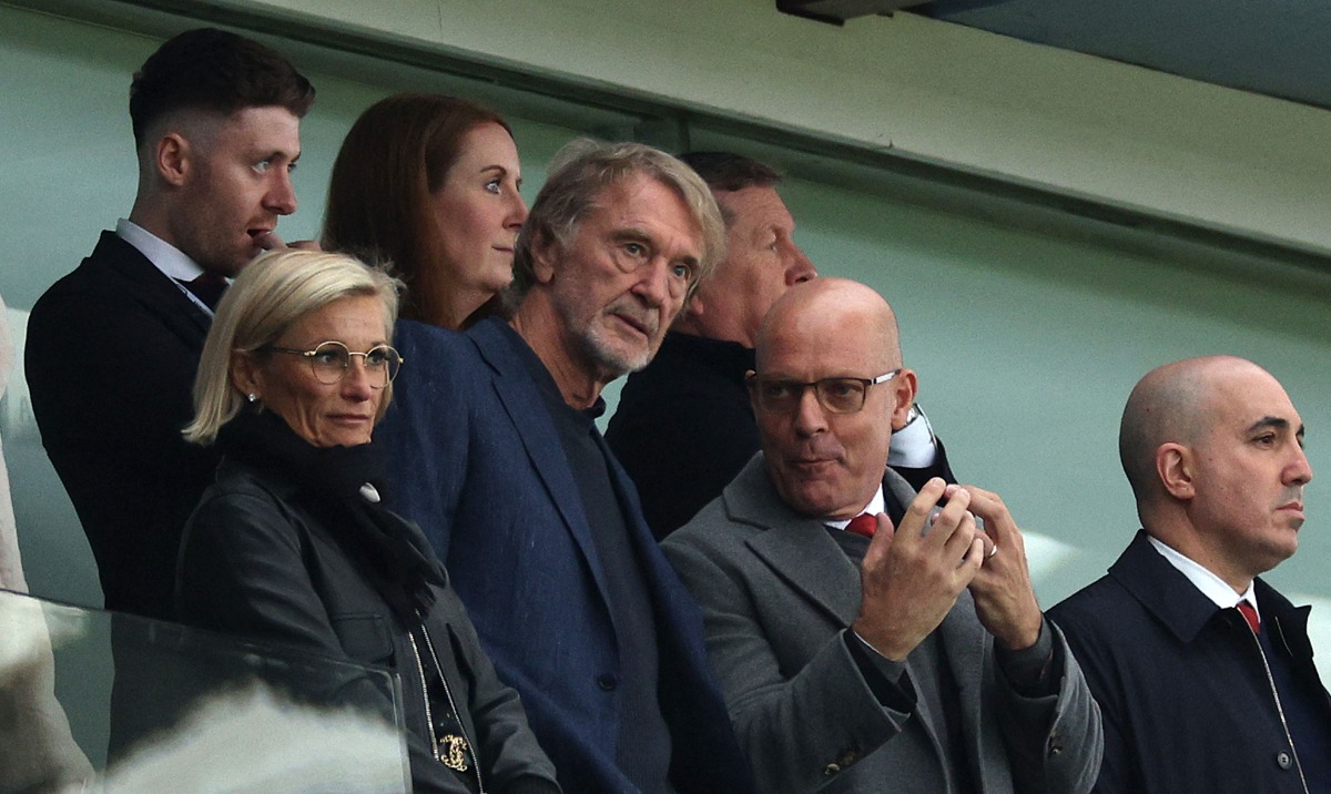 Manchester United's co-owner Jim Ratcliffe (4L) talks with David Brailsford (2R) during the English Premier League football match between Aston Villa and Manchester United at Villa Park in Birmingham, central England on October 6, 2024. (Photo by Adrian Dennis / AFP)