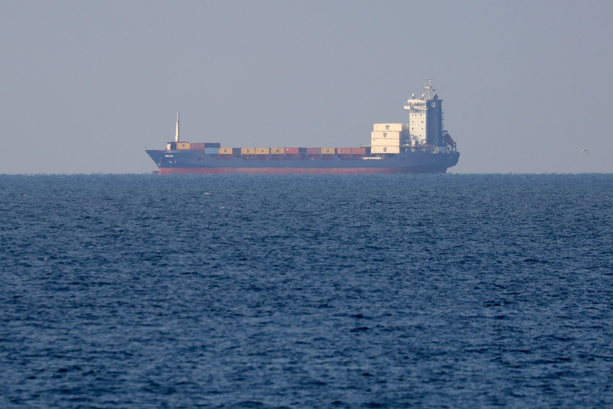 Turkish-flagged Moliva container ship is seen anchored in Durres about one kilometre from the port on October 28, 2024. Photo by Adnan Beci / AFP