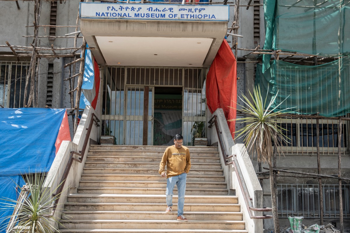A visitor exits the National Museum of Ethiopia in Addis Ababa, on November 19, 2024. (Photo by Amanuel Sileshi / AFP)
