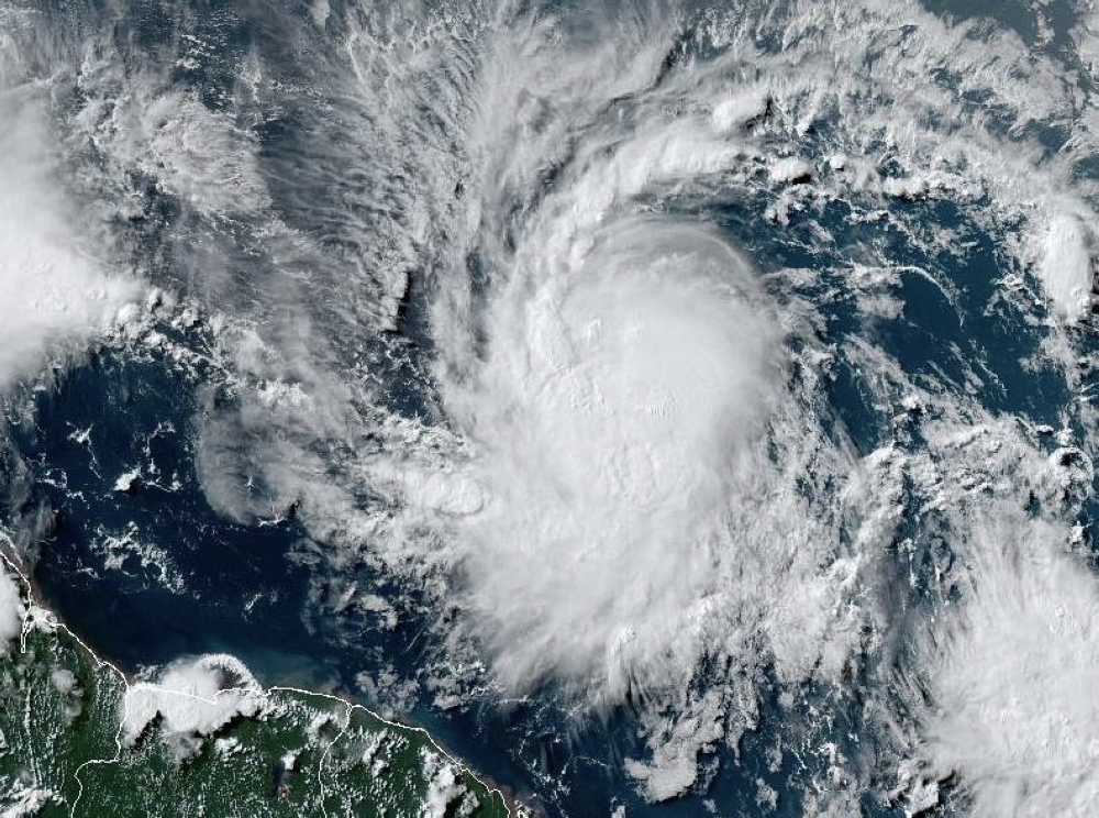 This National Oceanic and Atmospheric Administration (NOAA)/GOES satellite handout image shows Tropical Storm Beryl at 19:30UTC on June 29, 2024. (Photo by Handout / NOAA/GOES / AFP)


