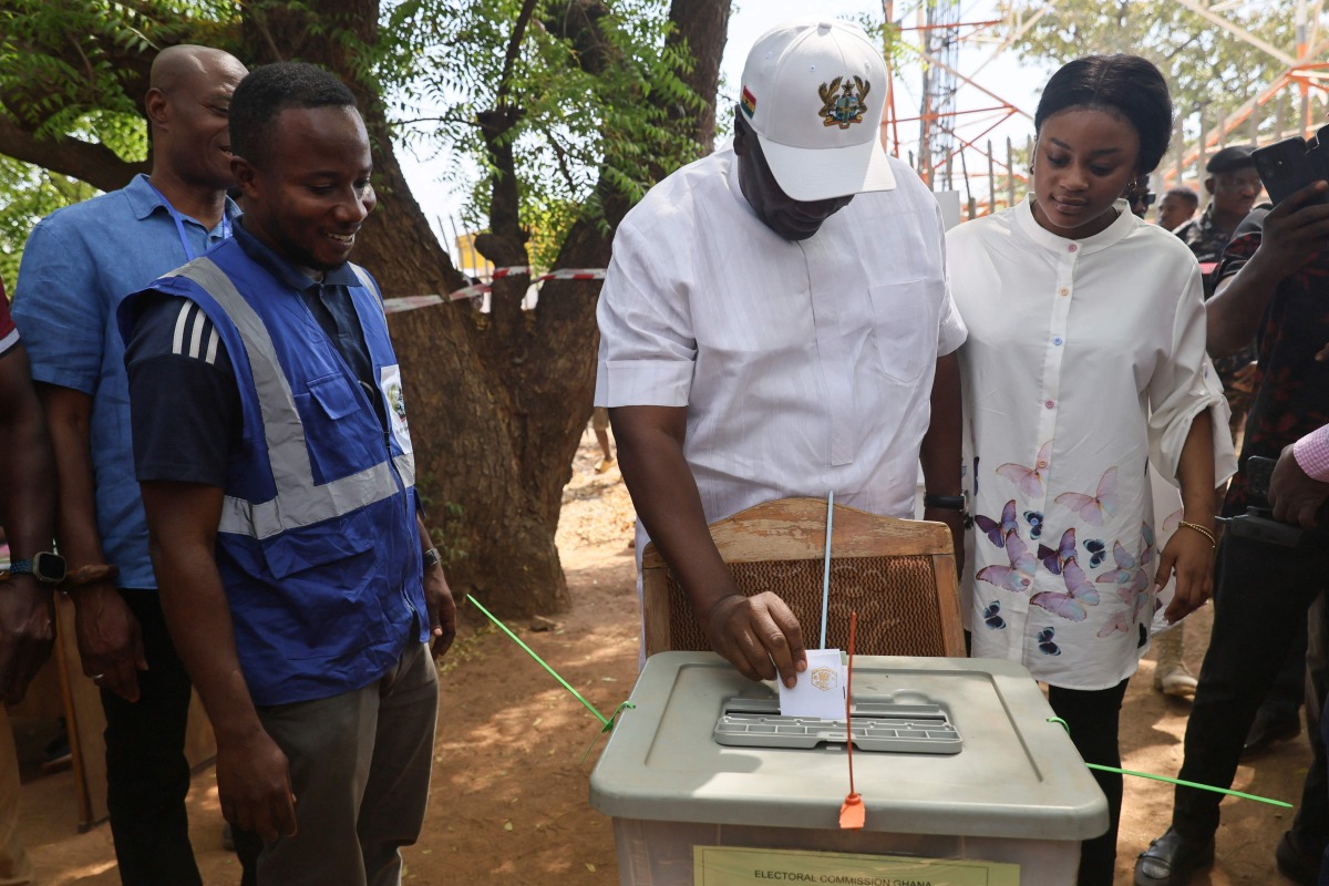 Former Ghana President and presidential candidate of the National Democratic Congress (NDC) party John Mahama casts his ballot at a polling station in Bole on December 7, 2024 during the Ghana presidential and parliamentary elections. (Photo by Nipah Dennis / AFP)
