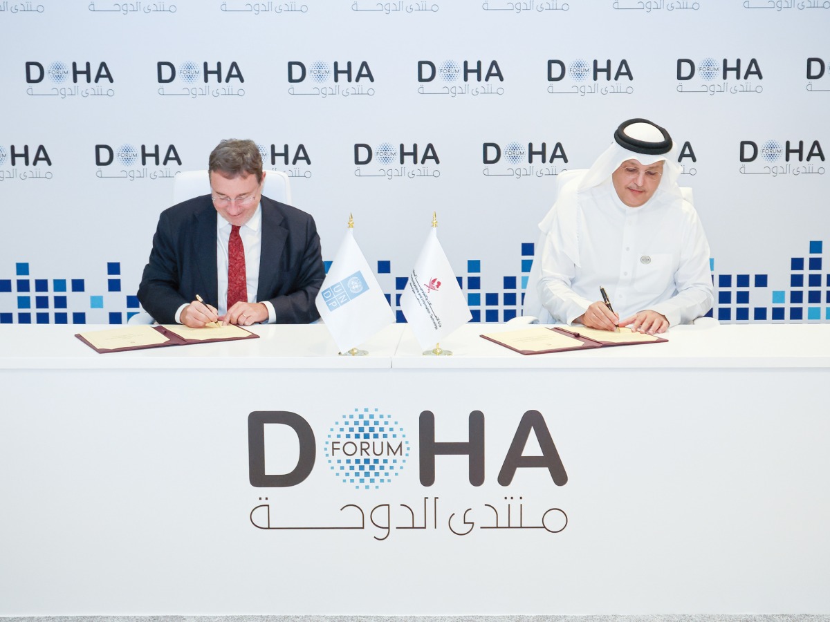 Minister of Communications and Information Technology H E Mohammed bin Ali Al Mannai and UNDP Administrator Achim Steiner signing the MoU at Doha Forum yesterday.
