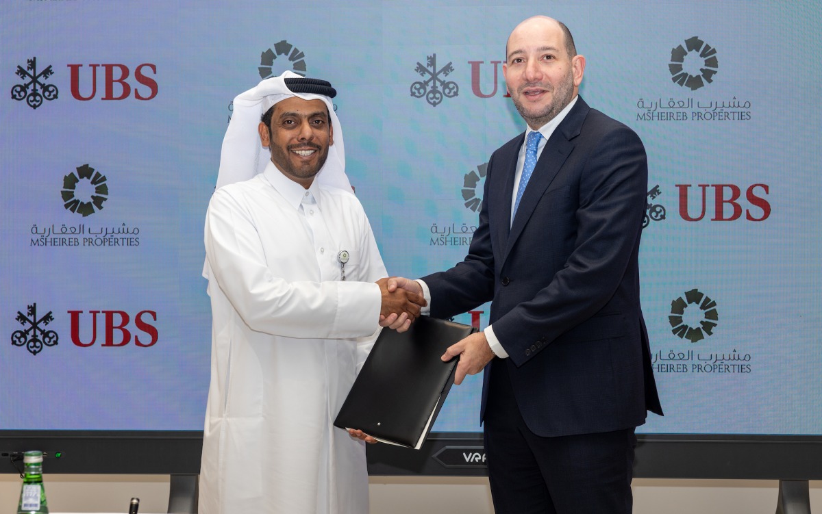 Msheireb Properties and UBS officials during the signing of the agreement.