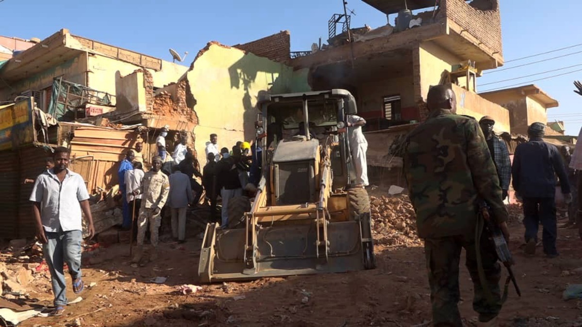 This photo taken on Feb. 1, 2025 shows workers using a loader to remove debris of a building damaged during an attack at Sabreen Market in Karari locality of Omdurman, north of the Sudanese capital Khartoum. (Khartoum State Press Office/Handout via Xinhua)
