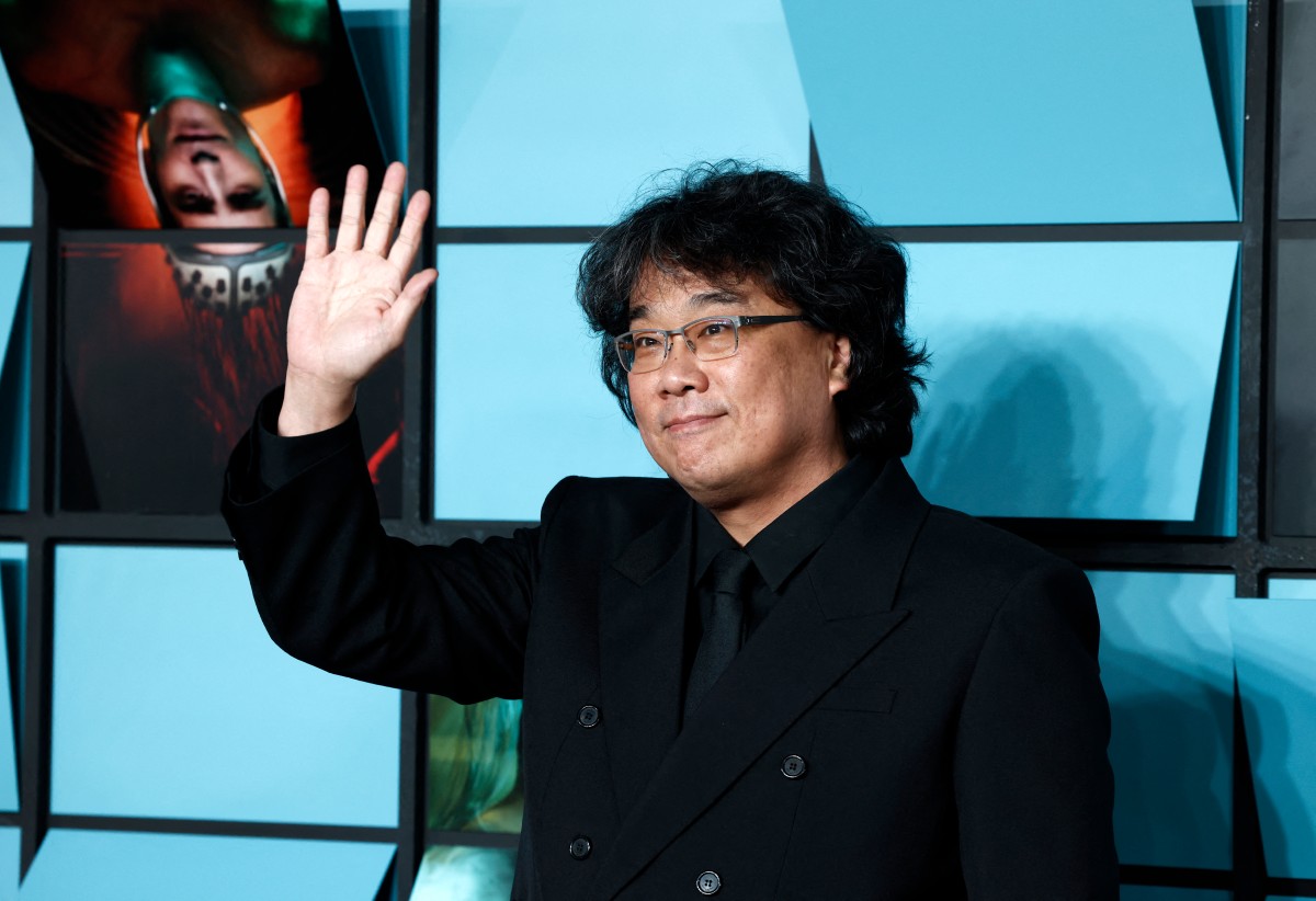South Korean director Bong Joon Ho poses upon arrival for the World premiere of the film