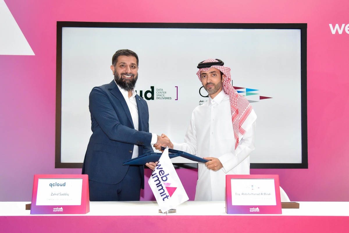 Acting Chief Operating Officer at QFZ Abdulla Hamad Al Binali and CEO of Qcloud Zahid Saddiq during the agreement signing.
