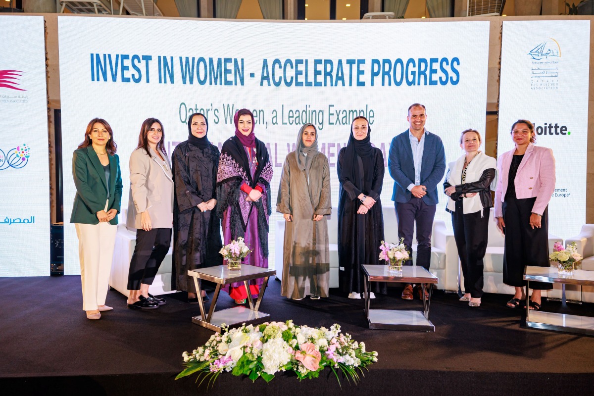 Vice Chairwoman of QBWA Aisha Alfardan pose for a group photo with other officials.