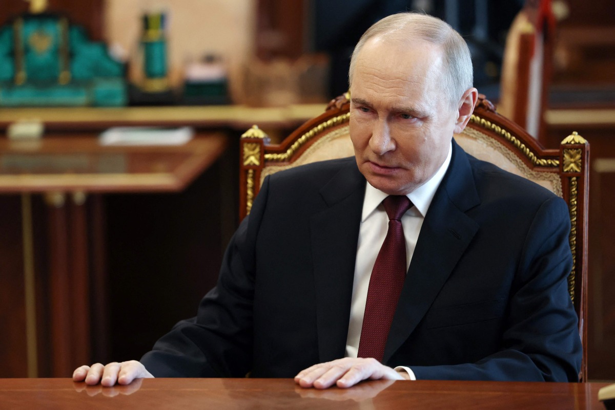In this pool photograph distributed by the Russian state agency Sputnik, President Vladimir Putin meets with Chief of the General Staff of the Russian Armed Forces in Moscow on April 19, 2025. (Photo by Vyacheslav PROKOFYEV / POOL / AFP)
