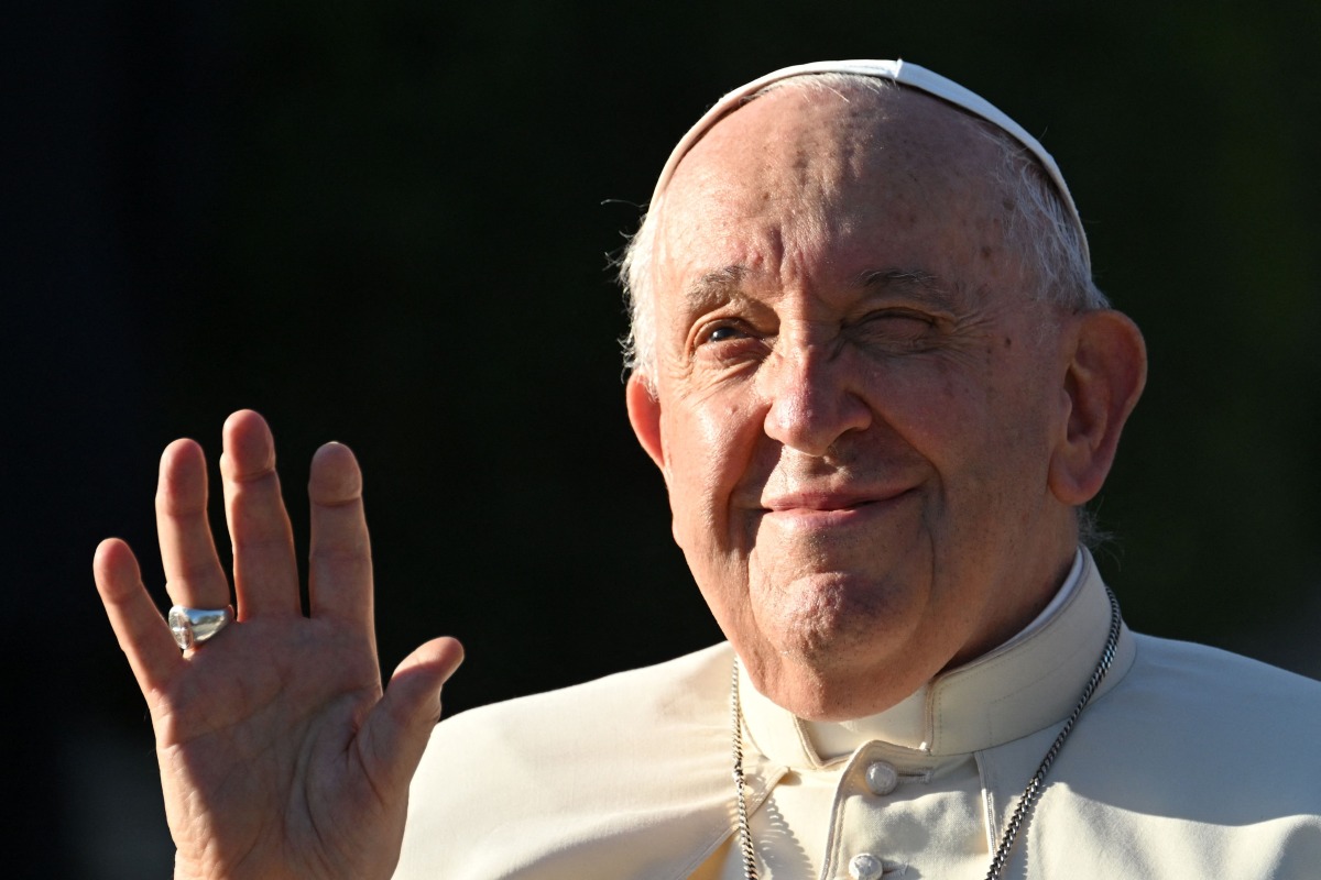 Pope Francis gestures as he departs the Saints Peter and Paul Cathedral following his meeting with bishops, priests, missionaries, consecrates persons and pastoral workers in Ulaanbaatar on September 2, 2023. Photo by Alberto PIZZOLI / AFP