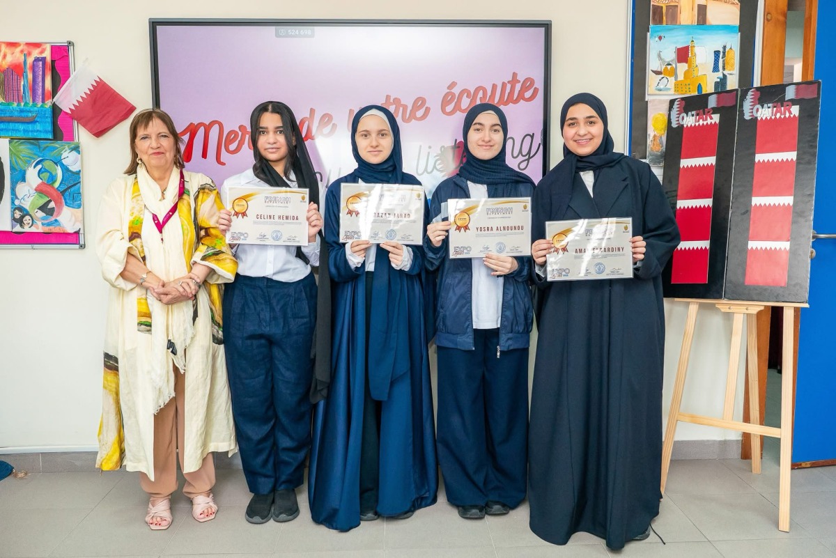 Students with an official at the event.