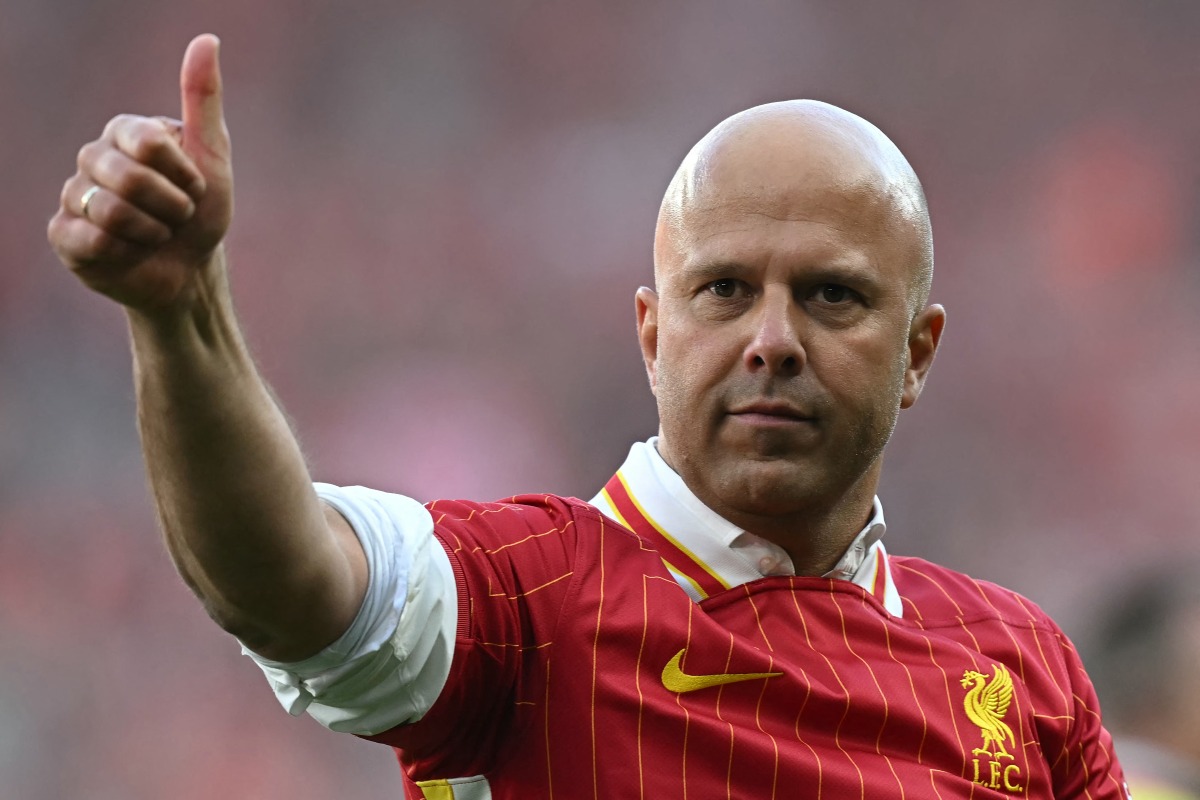 Liverpool's Dutch manager Arne Slot waves to the fans after the English Premier League football match between Liverpool and Tottenham Hotspur at Anfield in Liverpool, north west England on April 27, 2025. Photo by Paul ELLIS / AFP