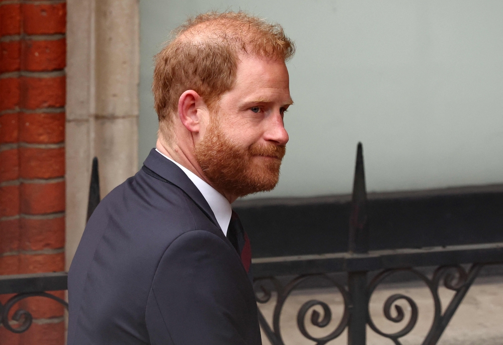 Britain's Prince Harry, Duke of Sussex arrives at the the Royal Courts of Justice, Britain's High Court, in central London, on April 8, 2025 for the second day of his appeal hearing over the downgrading of his personal security during visits in Britain. (Photo by Henry Nicholls / AFP)