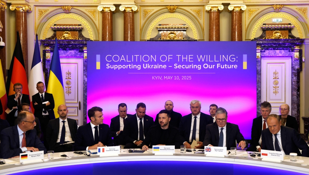 (From L) Germany's Chancellor Friedrich Merz, France's President Emmanuel Macron, Ukraine's President Volodymyr Zelensky, Britain's Prime Minister Keir Starmer and Poland's Prime Minister Donald Tusk attend a meeting of the 