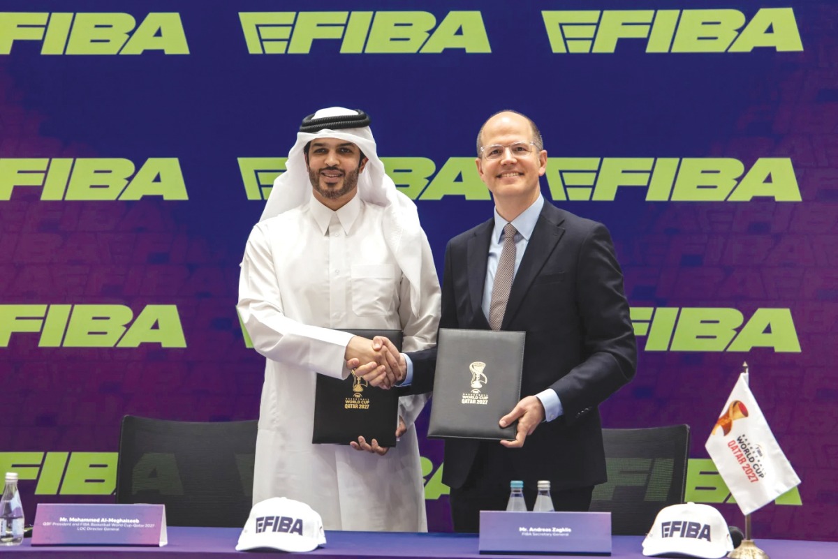 Qatar Basketball Federation President and the FIBA Basketball World Cup – Qatar 2027 LOC Director General, Mohammed Al-Meghaiseeb (left) and FIBA Secretary General Andreas Zagklis during agreement signing ceremony.