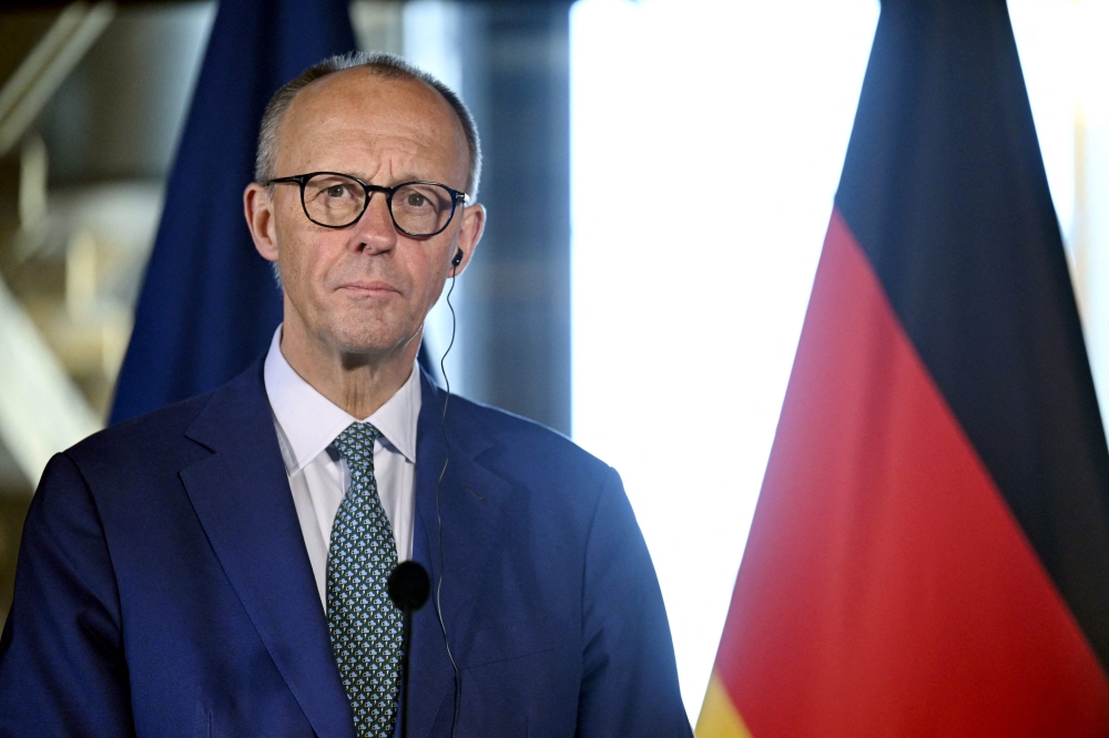 German Chancellor Friedrich Merz / Photo by Roni Rekomaa / Lehtikuva / AFP