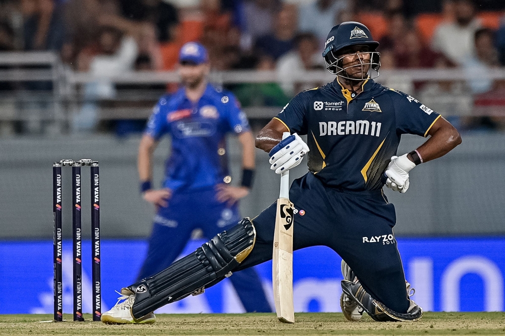 Gujarat Titans' Sai Sudharsan reacts after playing a shot during the Indian Premier League (IPL) Twenty20 Eliminator cricket match between Gujarat Titans and Mumbai Indians on May 30, 2025. (Photo by Shammi Mehra / AFP)