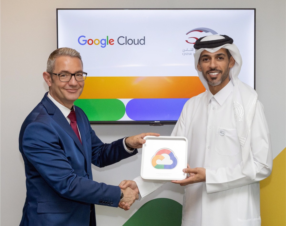 QIC Group CEO Salem Al Mannai receiving an award from Google Cloud Vice President, EMEA South, Anthony Cirot.