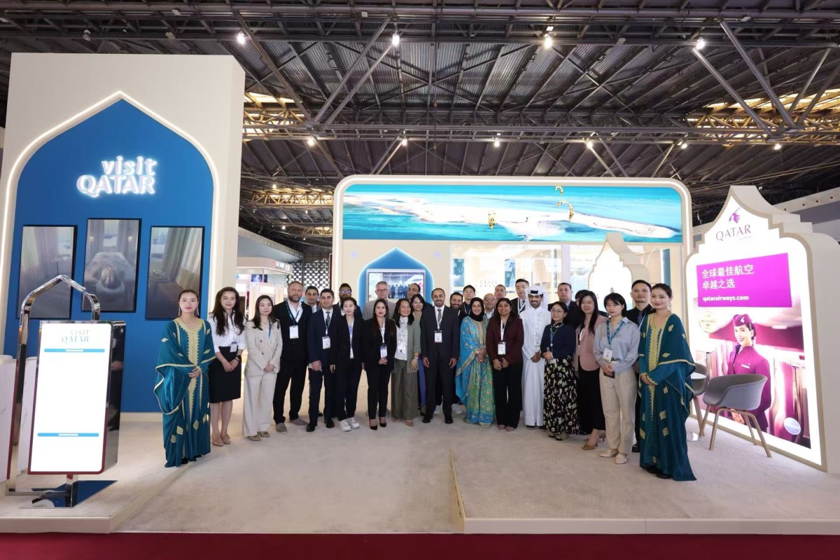 Representatives and partners at Visit Qatar pavilion at ITB China 2025.