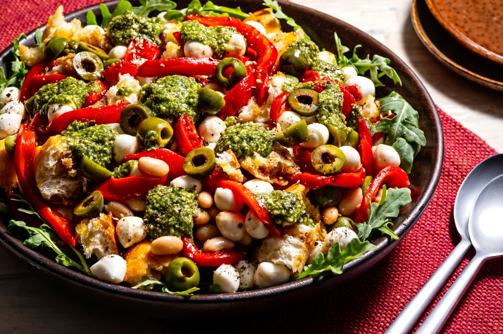 Roasted Red Pepper Salad With Mozzarella, Olives and Pesto. (Photo by Scott Suchman; food styling by Lisa Cherkasky/Both for The Washington Post)