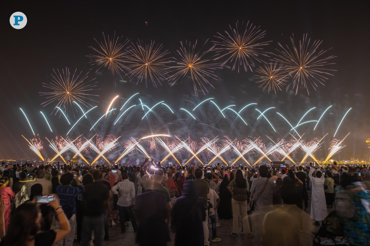 Citizens and residents witness fireworks at Katara yesterday 
