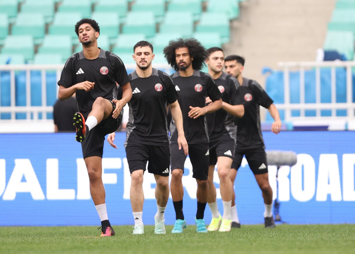 Qatar players attend a training session on the eve of their match against Uzbekistan at Bunyodkor Stadium in Tashkent.