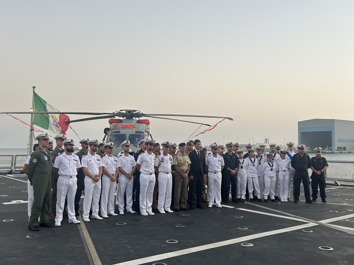 Ambassador of Italy to Qatar H E Paolo Toschi in a group photograph with the crew of the frigate.