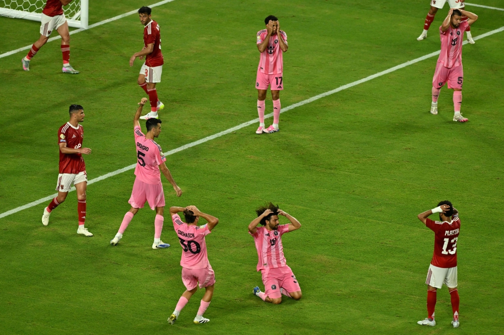 Inter Miami's Uruguayan defender #37 Maximiliano Falcon (bottom C) reacts after a missed scoring opportunity during the Club World Cup 2025 Group A football match between Egypt's Al-Ahly and US Inter Miami at the Hard Rock stadium in Miami on June 14, 2025. (Photo by Roberto Schmidt / AFP)