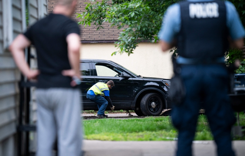 A vehicle belonging to Vance Boelter is towed from the alley behind his home on June 14, 2025 in Minneapolis, Minnesota. Stephen Maturen/Getty Images/AFP 