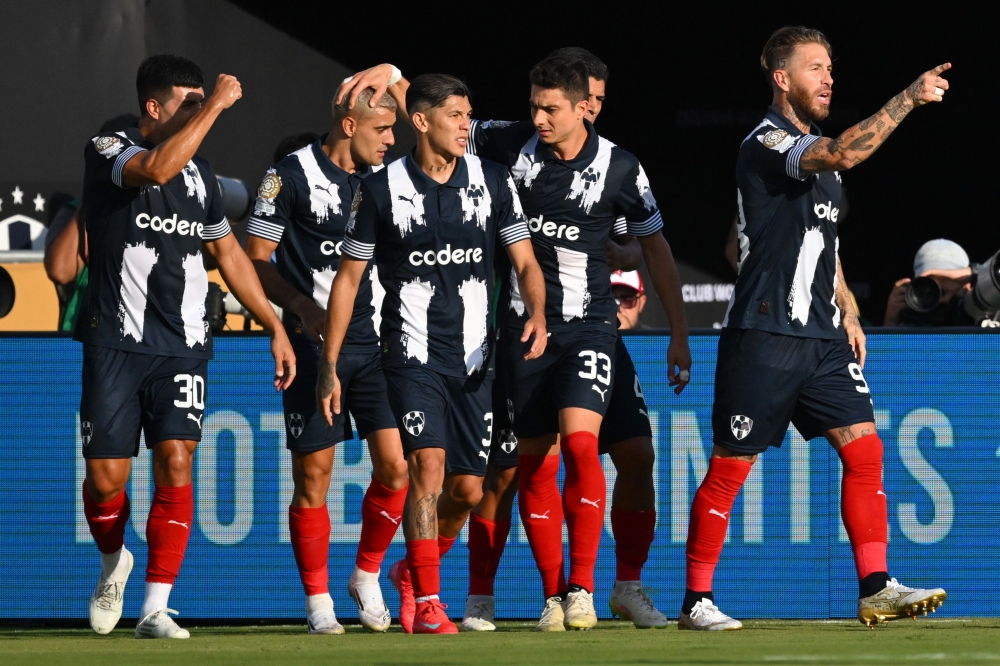 Monterrey's Spanish defender #93 Sergio Ramos (R) celebrates after scoring the opening goal next to teammates during the FIFA Club World Cup 2025 Group E football match between Mexico's Monterrey and Italy's Inter Milan at the Rose Bowl stadium in Pasadena on June 17, 2025. (Photo by Patrick T. Fallon / AFP)
 