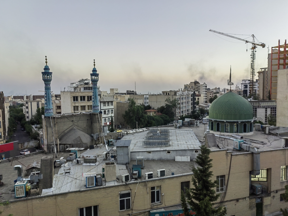 This photo taken with a mobile phone shows smoke in Tehran, capital of Iran. (Xinhua/Shadati)