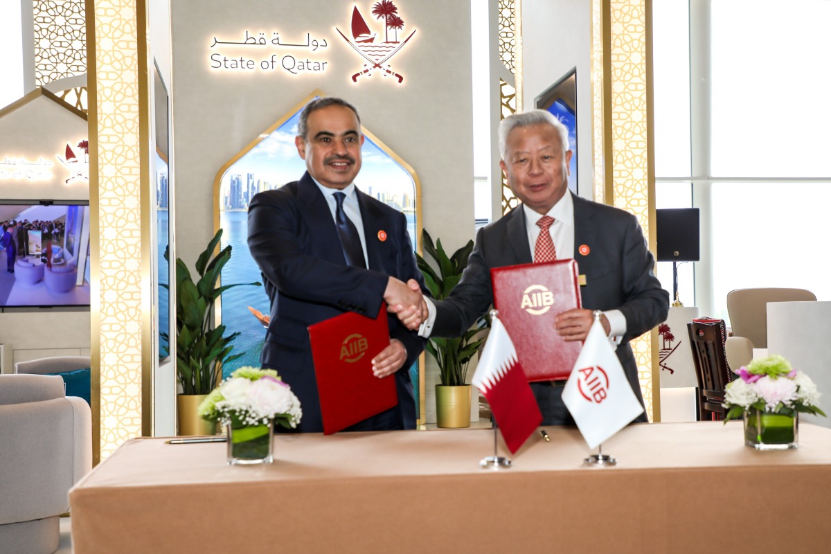 Minister of Finance, H E Ali bin Ahmed Al Kuwari with President of the Asian Infrastructure Investment Bank, H E Jin Liqun during agreement signing on the sidelines of the annual meeting of AIIB in Beijing, China.