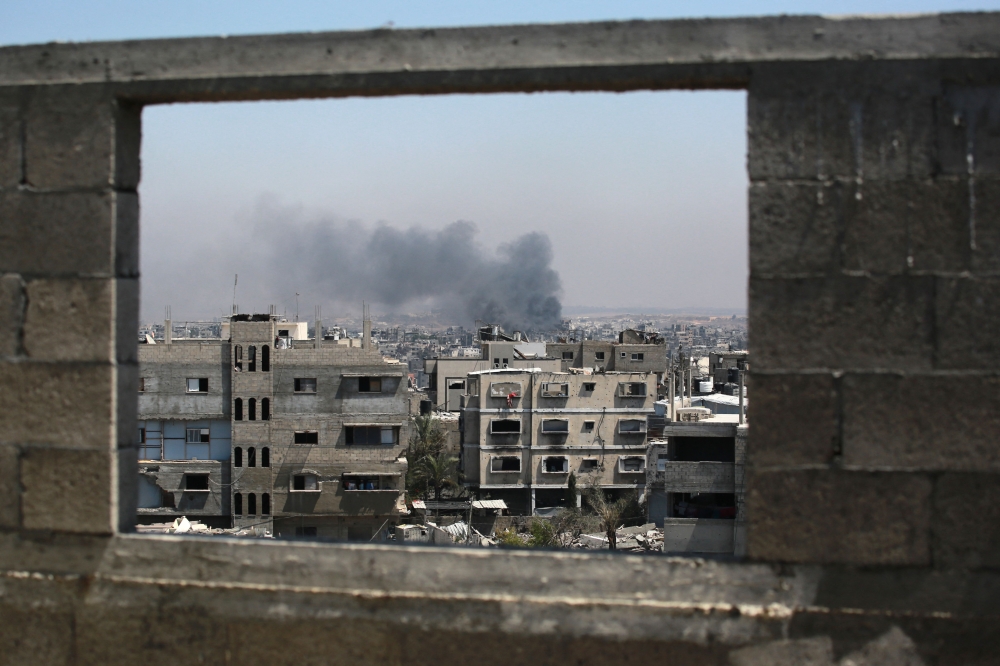 Smoke billows after an Israeli strike on Jabalia in the northern Gaza Strip on June 28, 2025. (Photo by Bashar Taleb / AFP)