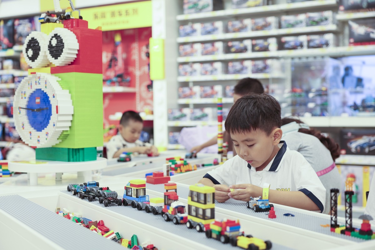 Children play with LEGO bricks at a shop of the LEGOLAND Shanghai Resort in Shanghai, east China, July 5, 2025. (Xinhua/Wang Xiang)