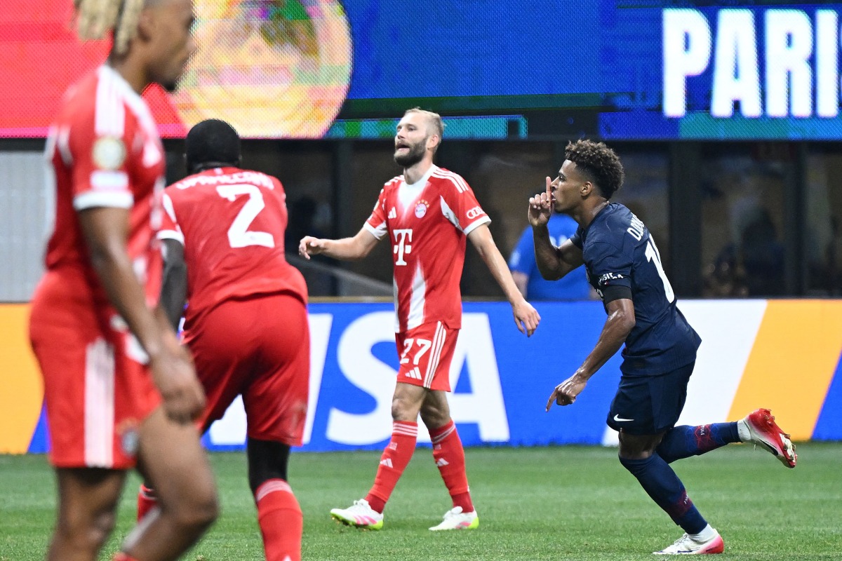 Paris Saint-Germain's French midfielder #14 Desire Doue celebrates scoring his team's first goal during the FIFA Club World Cup 2025 quarterfinal football match between France's Paris Saint-Germain and Germany's Bayern Munich at the Mercedes-Benz Stadium in Atlanta on July 5, 2025. (Photo by PATRICIA DE MELO MOREIRA / AFP)