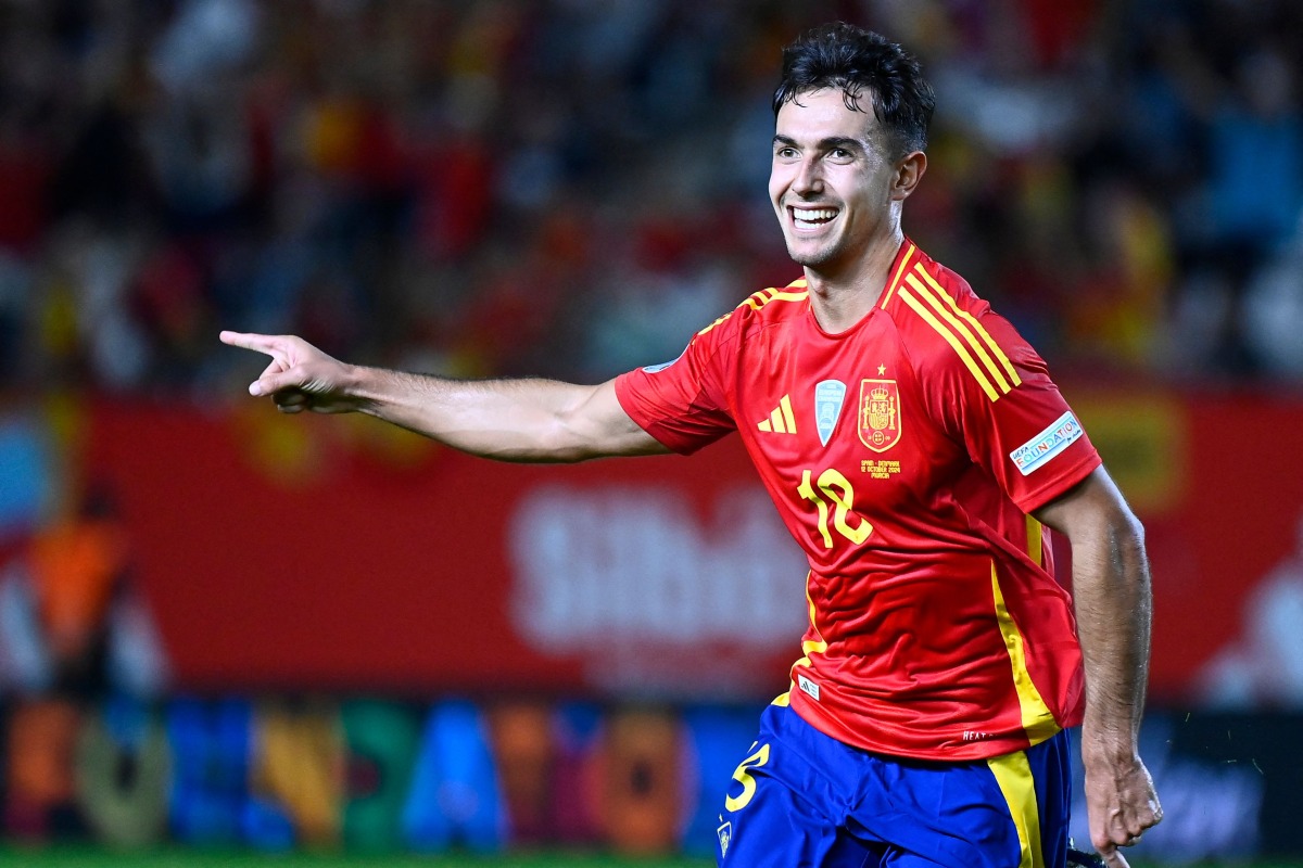 Spain's midfielder #18 Martin Zubimendi celebrates scoring the opening goal during the UEFA Nations League, league A group 4 football match between Spain and Denmark at Nueva Condomina stadium in Murcia, on October 12, 2024. Photo by JOSE JORDAN / AFP