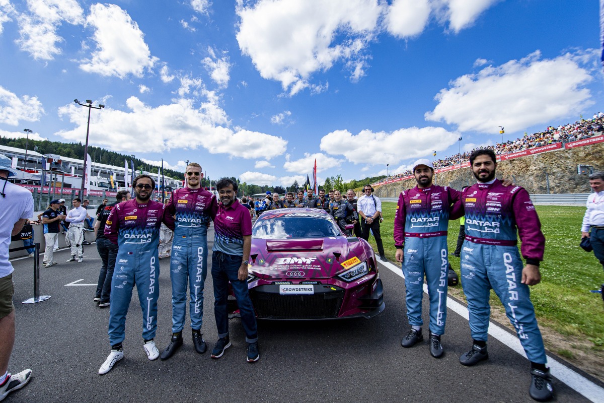 Qatar Motor and Motorcycle Federation President Abdulrahman bin Abdullatif Al Mannai (third left) poses with the QMMF by Saintéloc Racing drivers at the Spa-Francorchamps circuit.