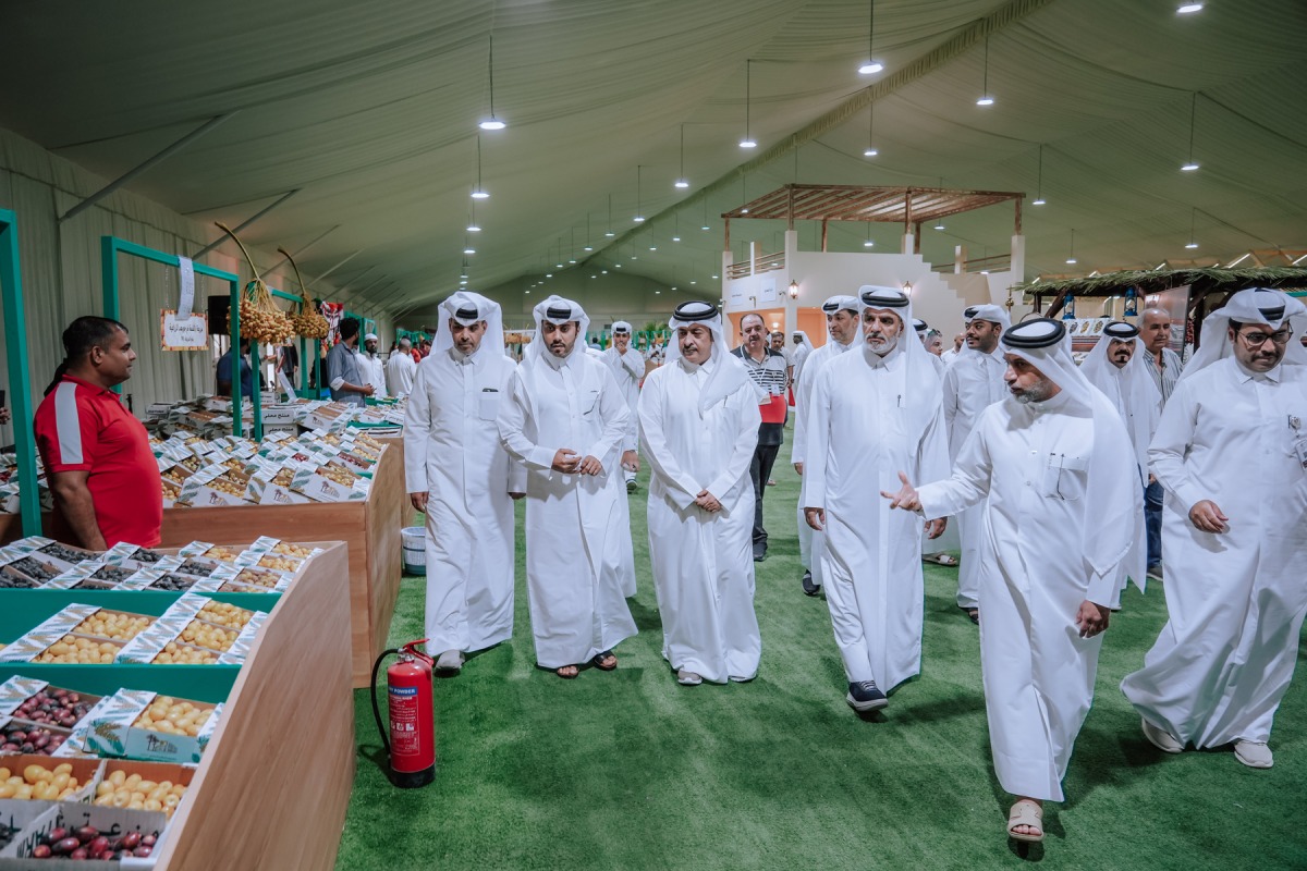 Assistant Undersecretary for Agricultural Affairs and Food Security at the Ministry of Municipality Eng. Fahad Mohammed Al-Qahtani, and the representative of the Private Engineering Office Abdulrahman Mohammed Al-Naama with other officials touring the festival.