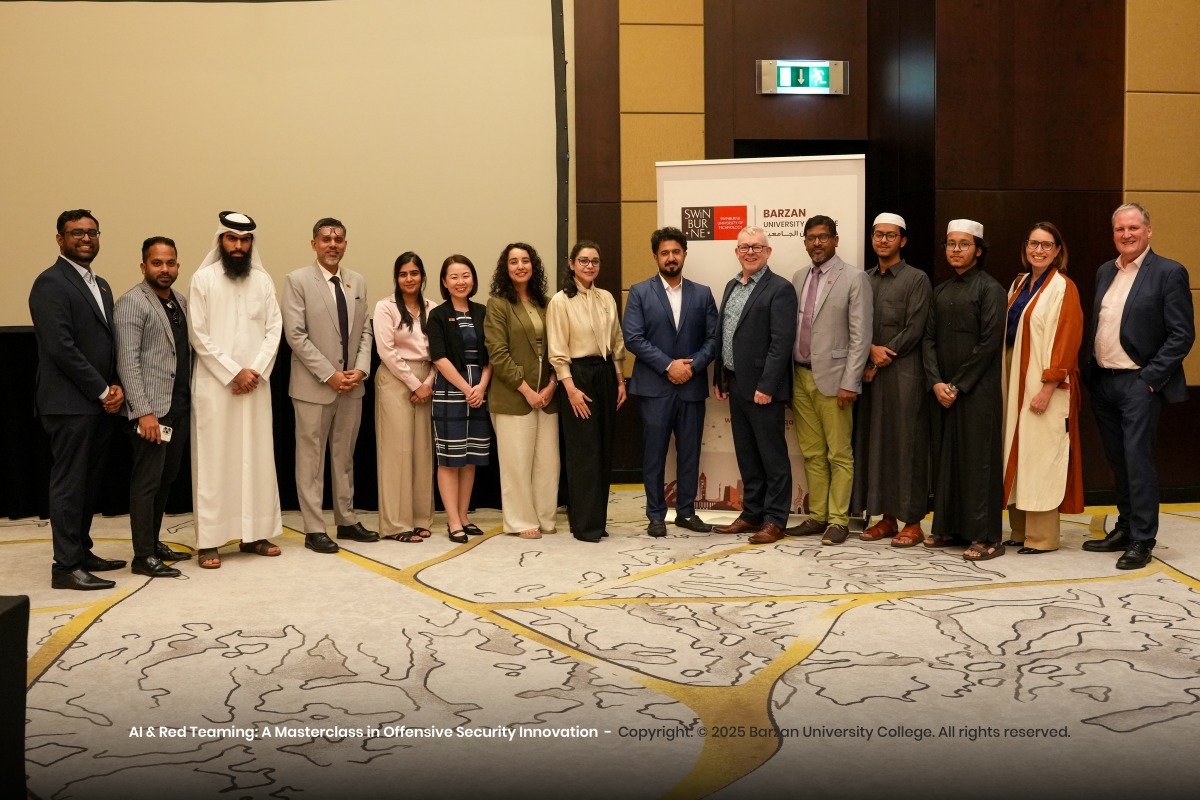 Officials from Swinburne University of Technology and Barzan University College in a group photo.